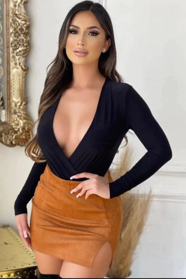 model wearing Black bodysuit with brown mini skirt