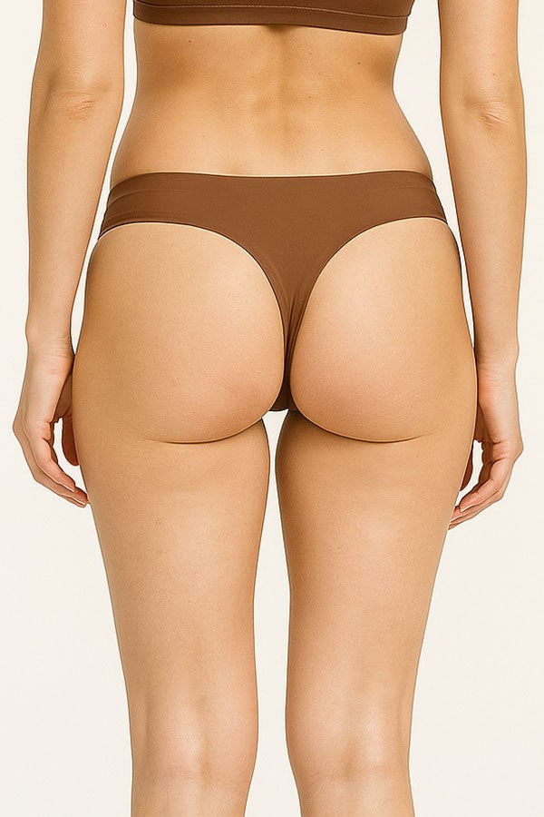 Brown underwear on a plain background