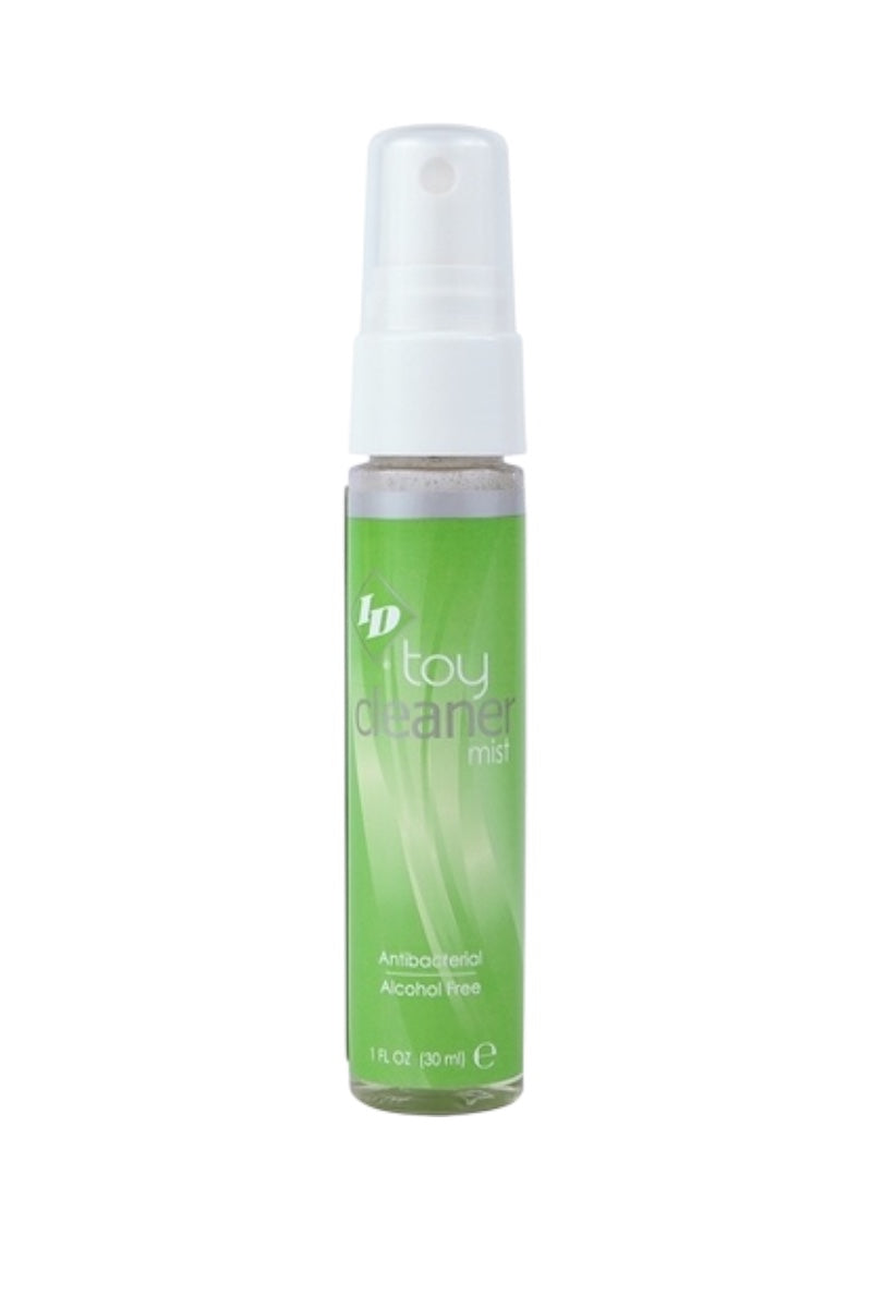 Green bottle of ID toy cleaner on a white background
