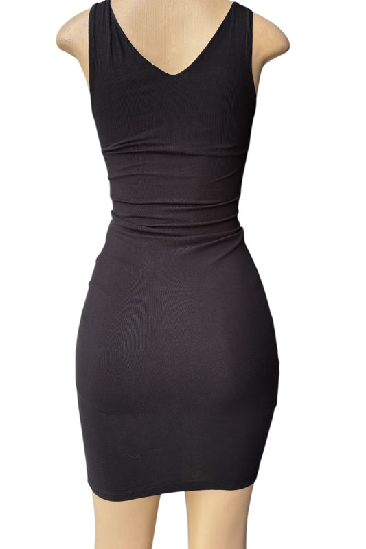 Black dress on a mannequin against a white background