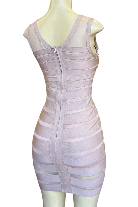 Mauve bandage dress on a mannequin against a white background