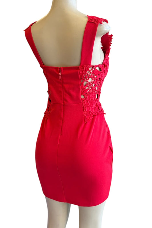 Red dress with cut-out back on a mannequin against a white background