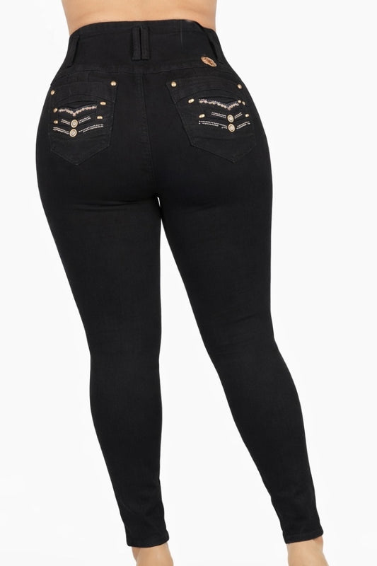 Black jeans with decorative elements on a white background