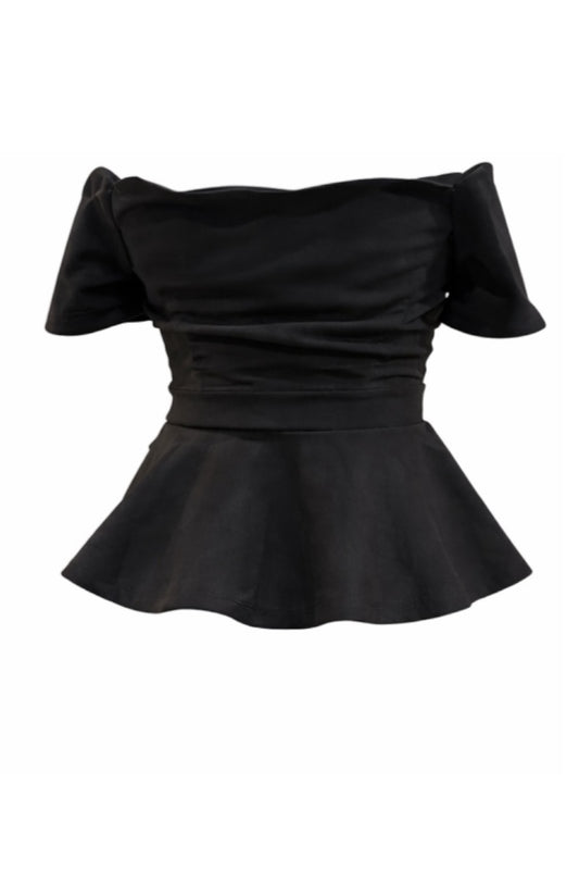 Black peplum top on a white background