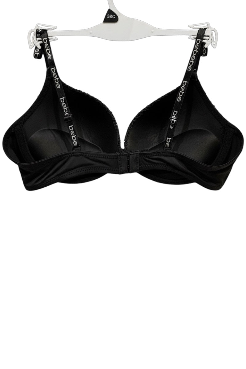 Black bra on a white hanger with visible branding.