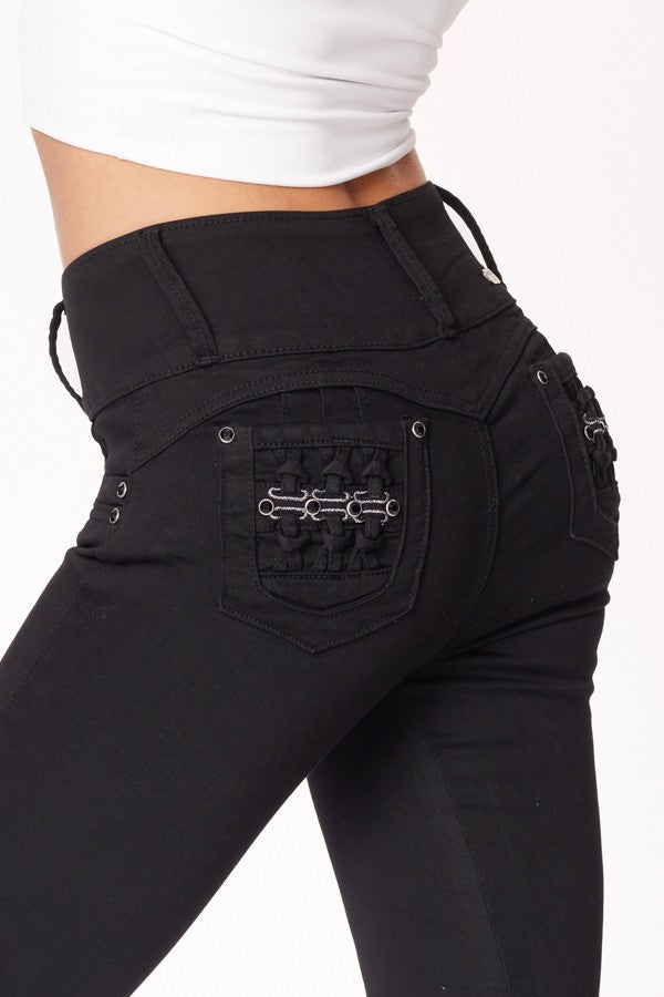 Black pants with unique pocket design on a white background
