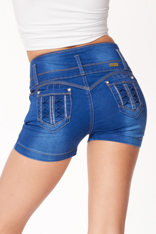 Blue denim shorts worn by a person on a white background