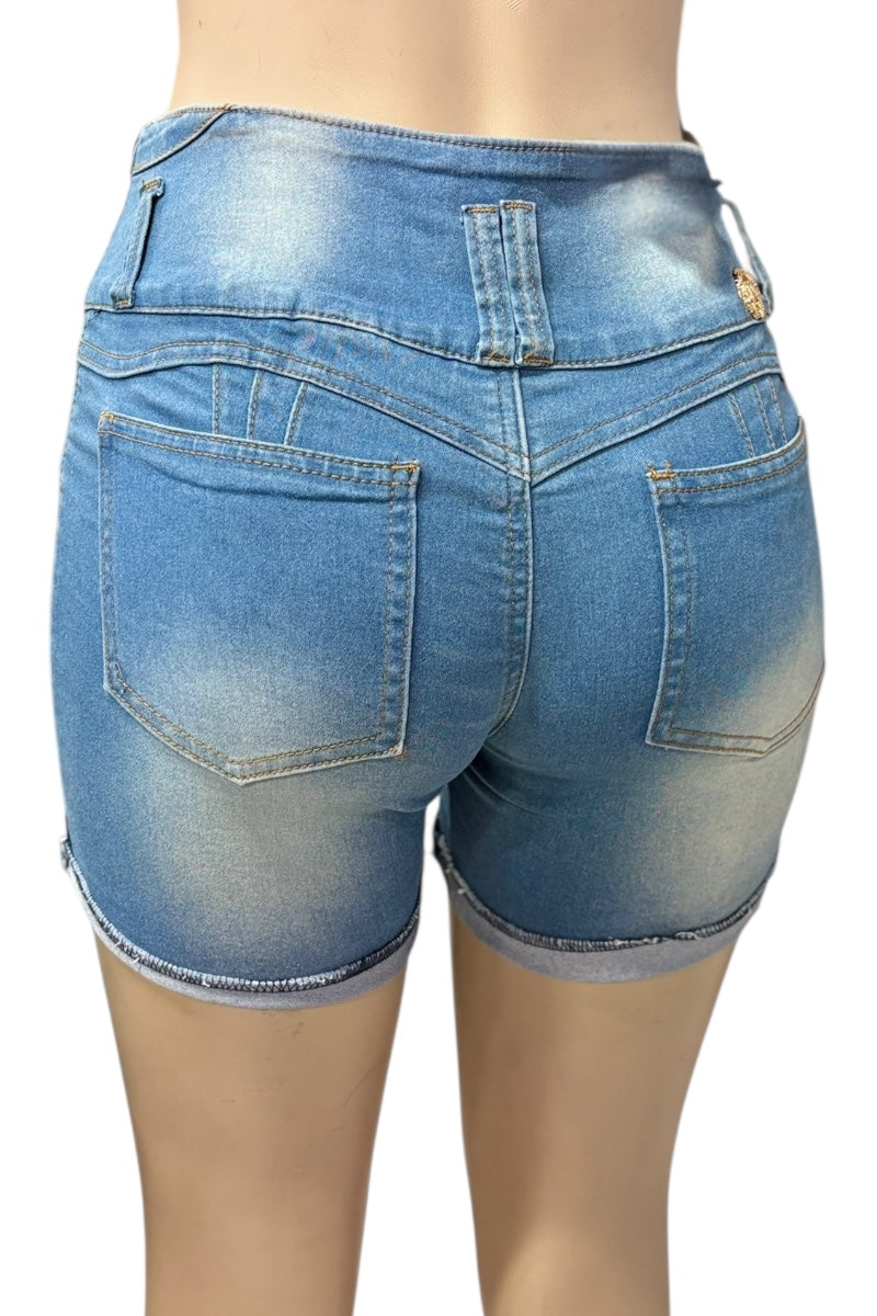 Blue denim shorts on a mannequin against a white background