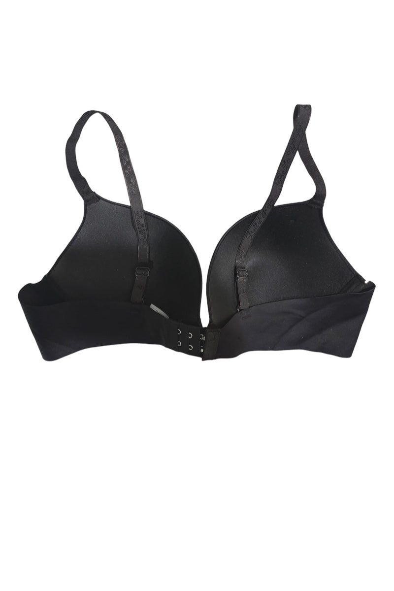 A black seamless underwire bra with adjustable shoulder straps and a central hook-and-eye closure, shown against a plain white background.