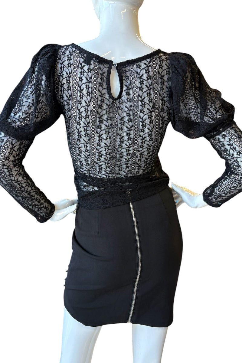 Mannequin wearing a black lace top and skirt set on a white background