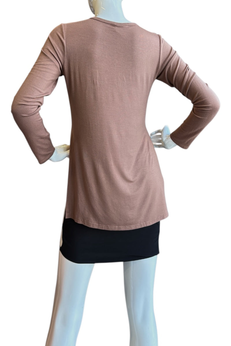 Mannequin wearing a brown long-sleeve top with a black bottom section on a white background