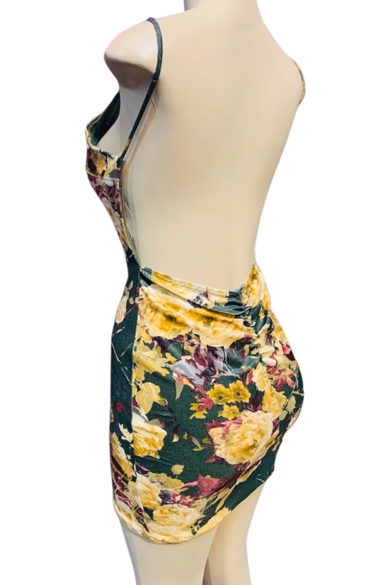 Floral dress on a mannequin against a white background