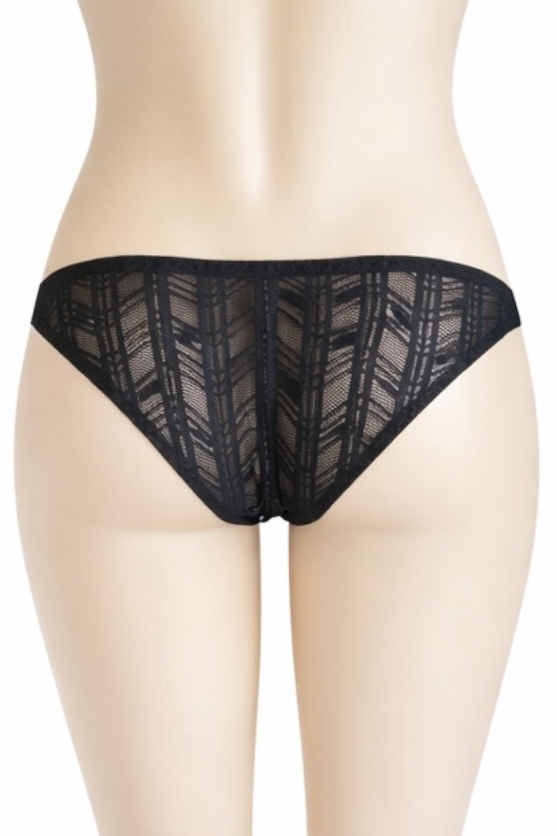 Black lace underwear on a mannequin against a white background