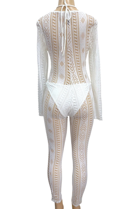 White lace cover-up on a mannequin against a white background