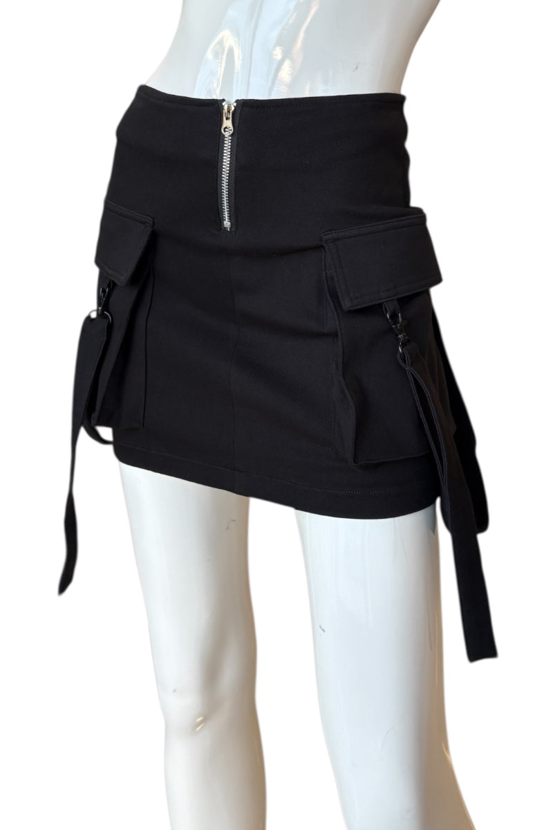 Black mini skirt with pockets and a zipper on a mannequin against a white background