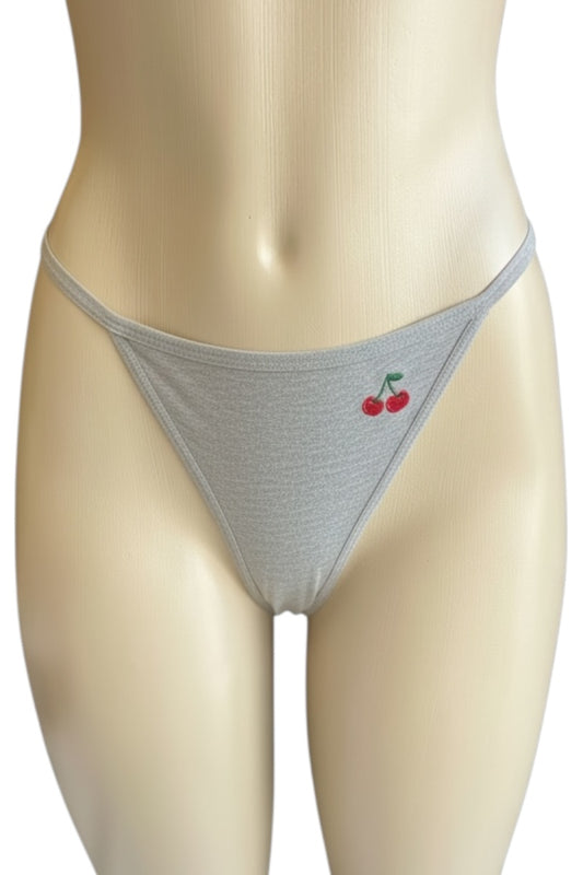 Gray thong with cherry design on a mannequin against a white background