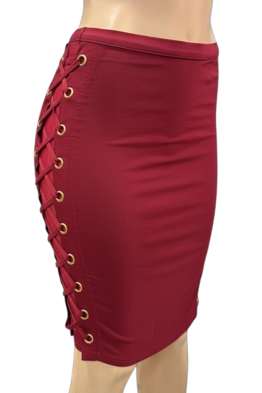 wine pencil skirt with gold button details on a white background