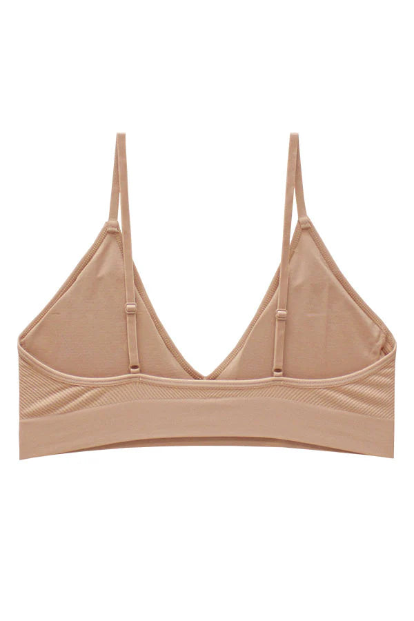 Beige bralette on a white background