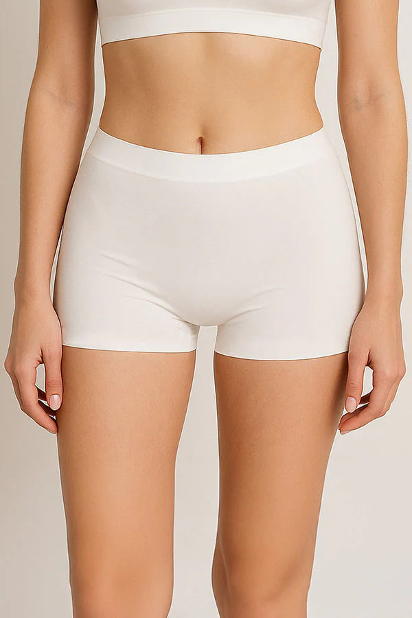 White high-waisted underwear on a neutral background