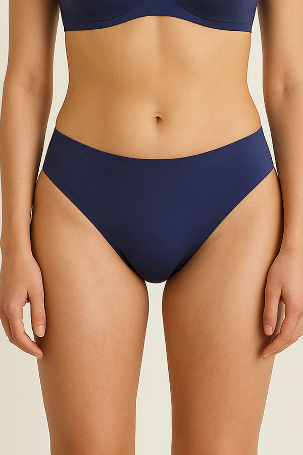 Navy blue bikini bottom on a beige background