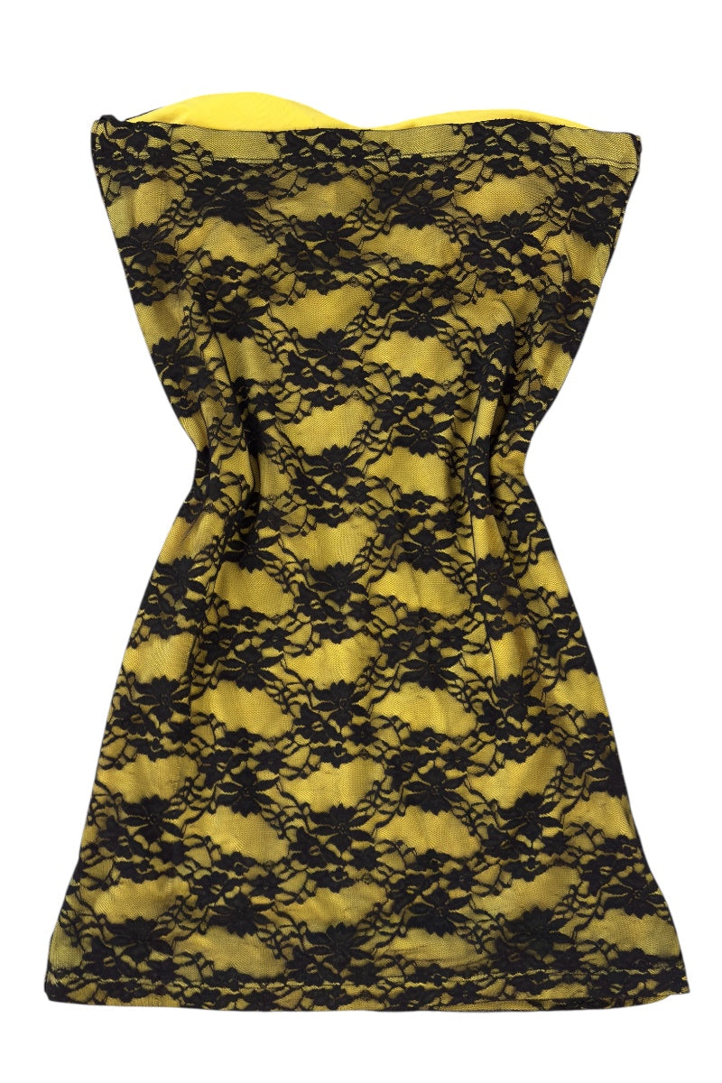 Yellow strapless dress with black lace detailing on a white background