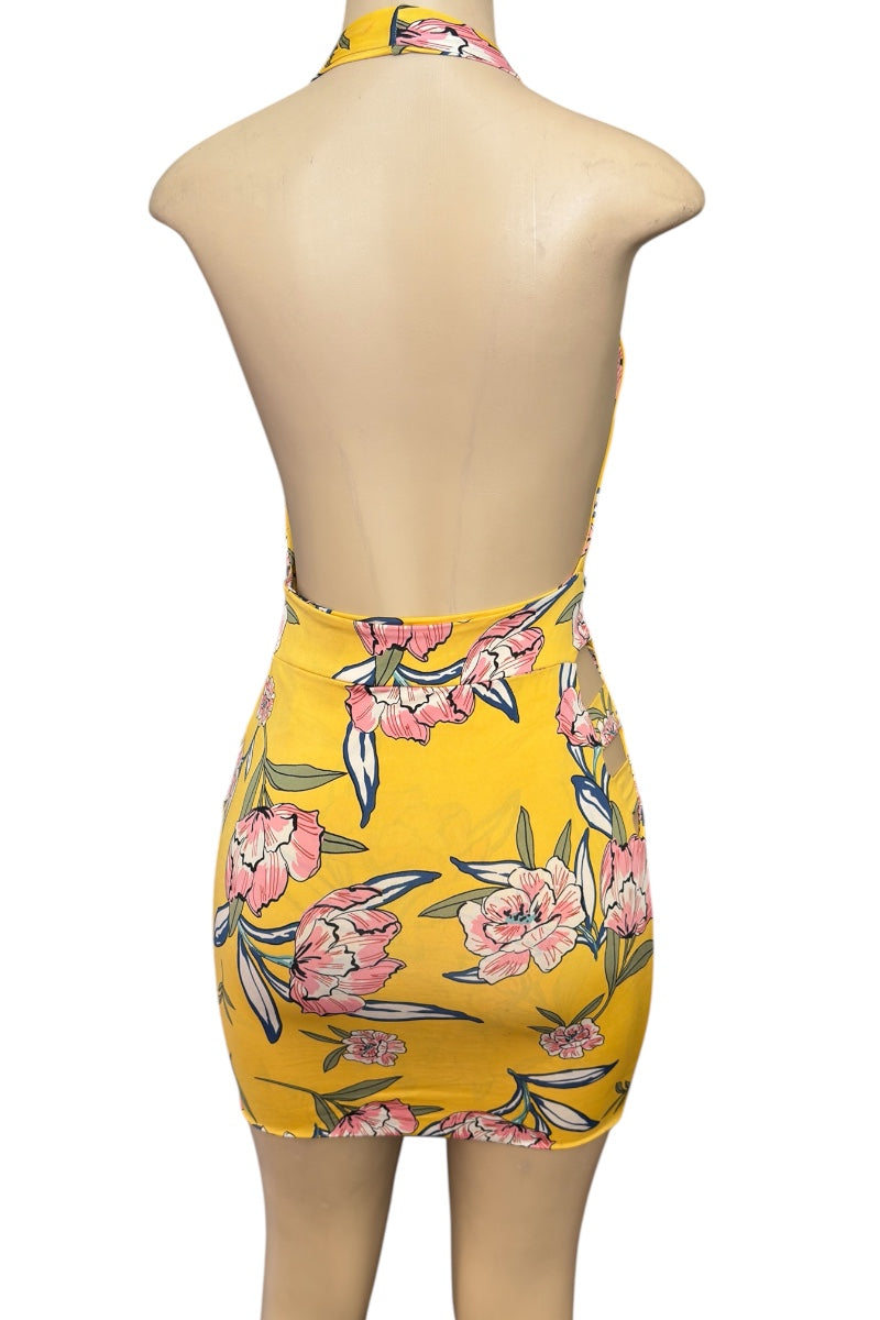 Yellow floral dress on a mannequin with a white background
