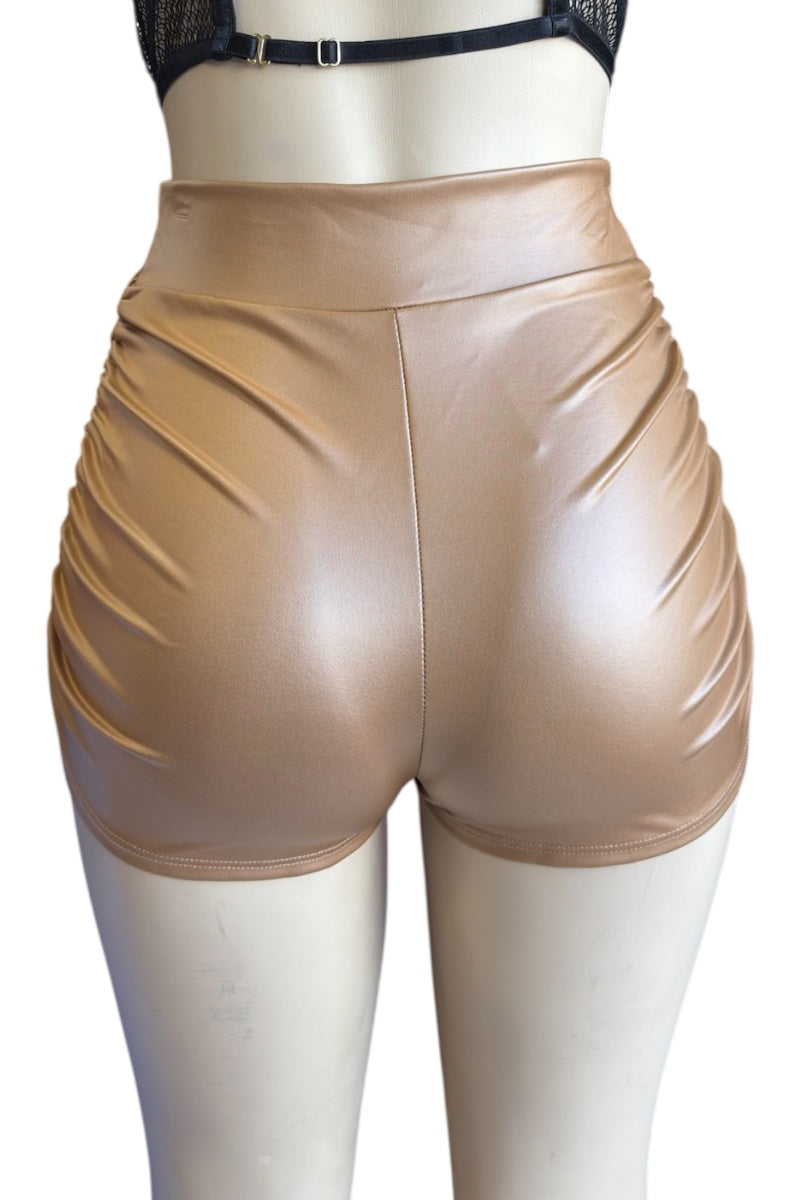 faux leather shorts on a mannequin against a white background