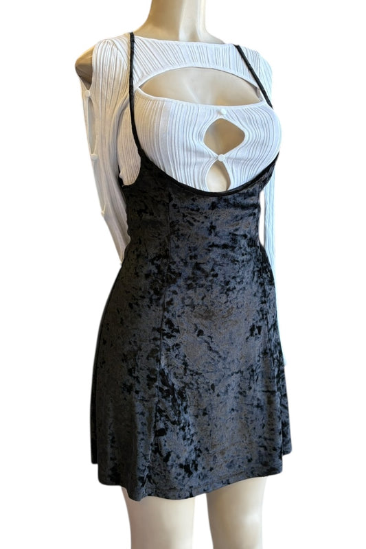 Black crushed velvet skirt with cut-out top on a mannequin against a white background
