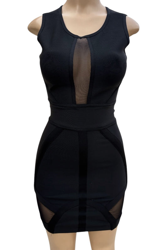 Black dress with mesh panels on a mannequin against a white background