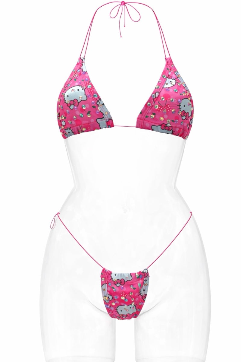 Bikini set with pink top and white bottom on a white background