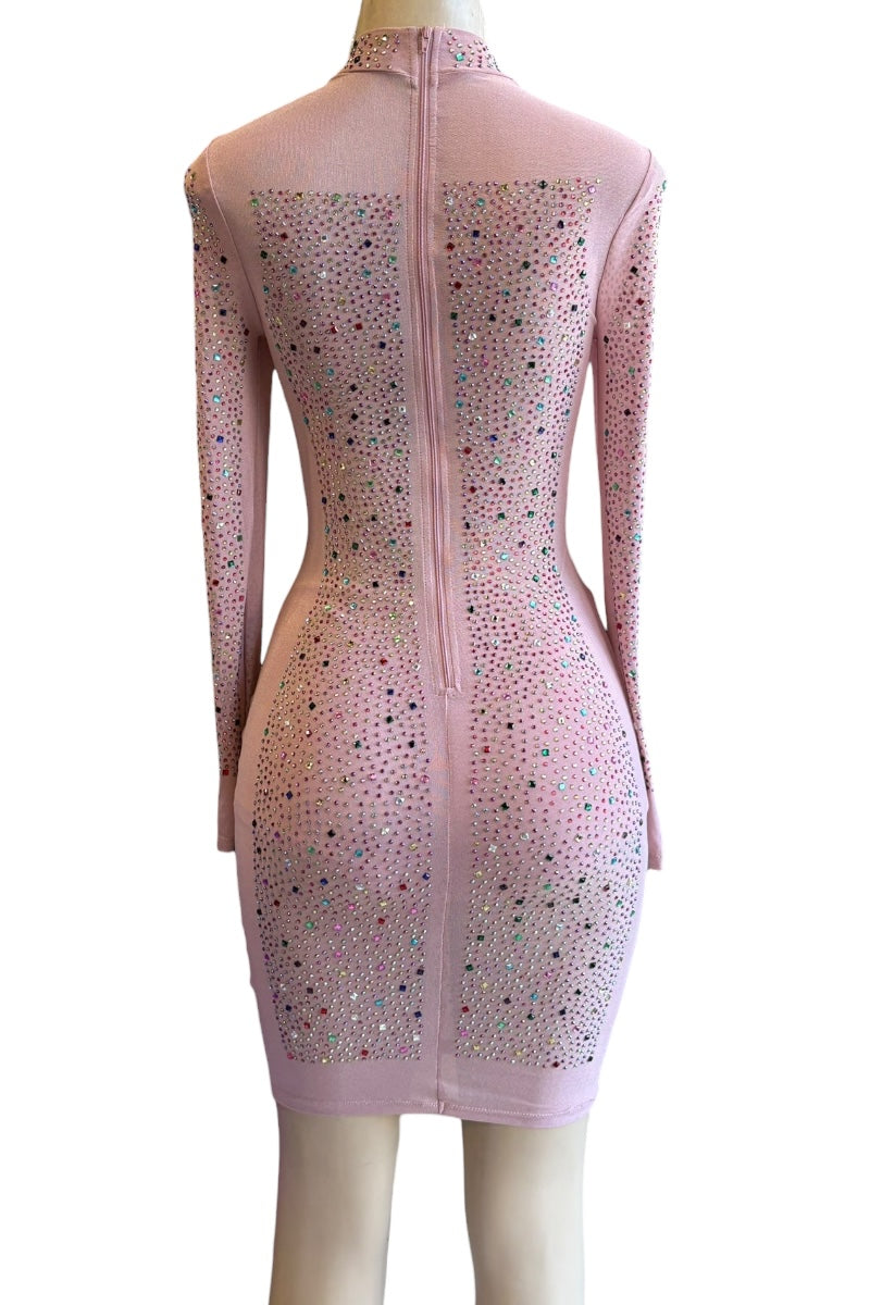 Pink dress with rhinestone detailing on a mannequin against a white background