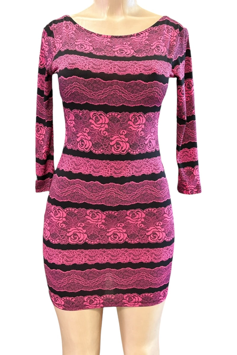 Pink and black patterned dress on a mannequin against a white background