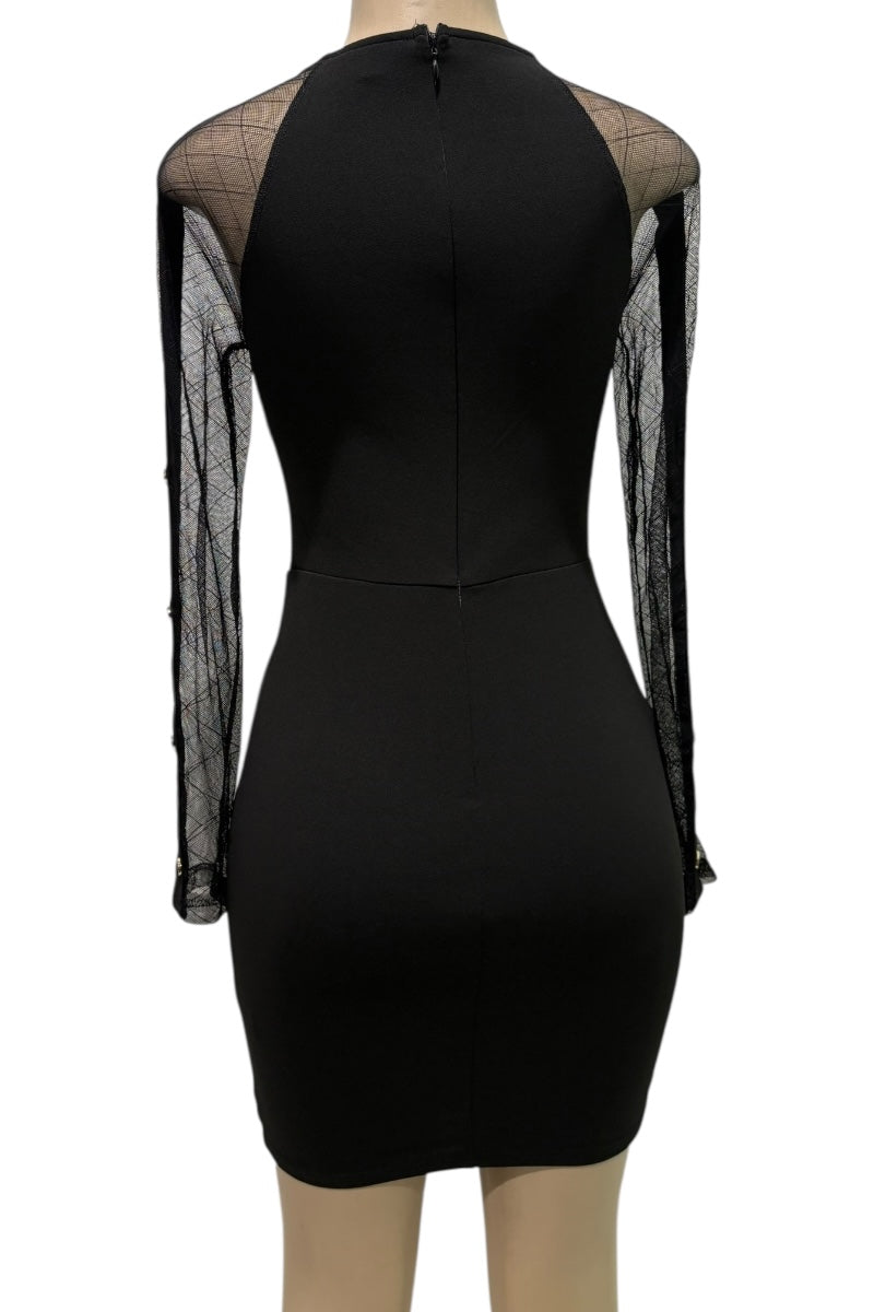 Black dress with sheer sleeves on a mannequin against a white background
