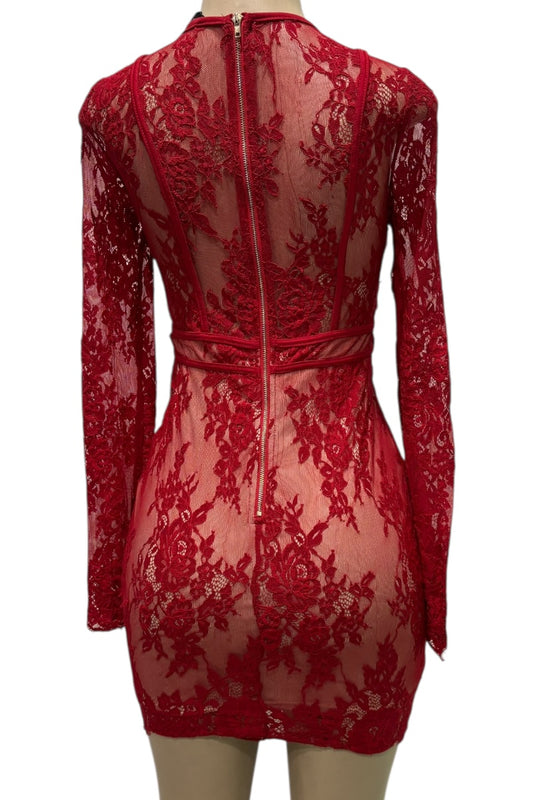 Red lace dress on a mannequin with a white background