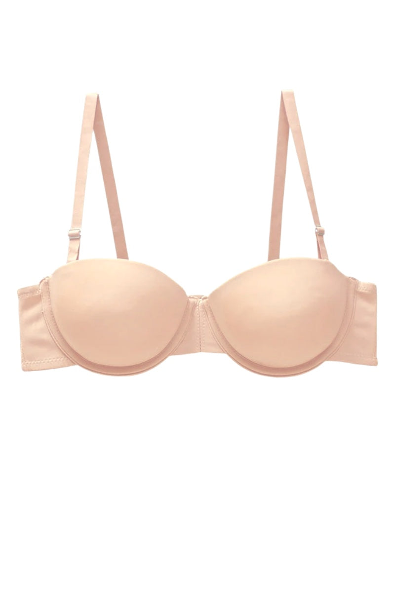 A light peach-beige wireless underwire bra with adjustable shoulder straps, shown against a plain white background.