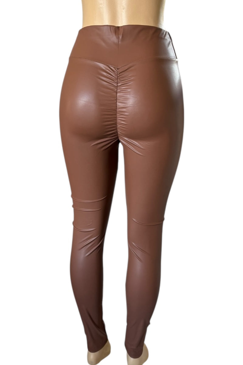 Brown leather leggings on a white background
