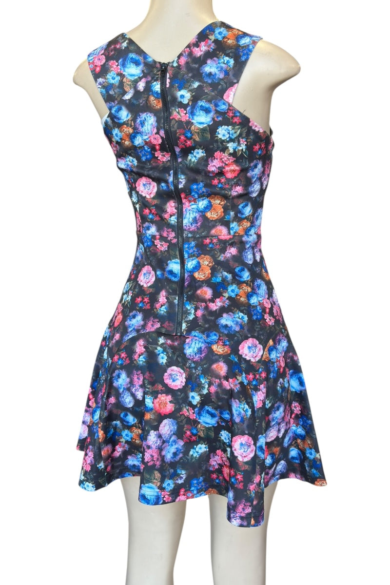 Floral dress on a mannequin against a white background