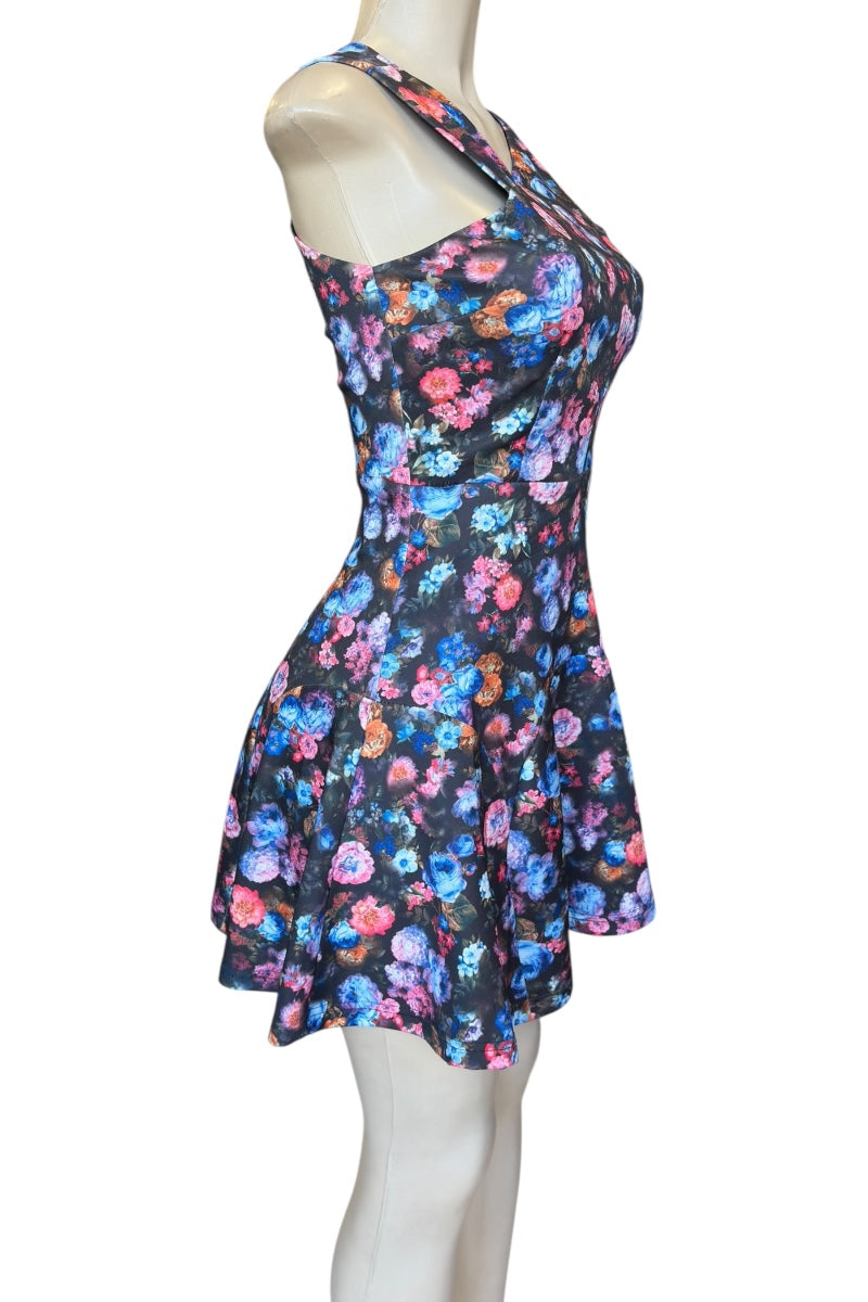 Floral dress on a mannequin against a white background
