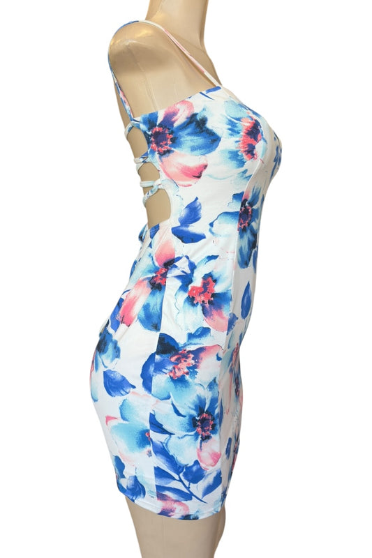 Floral dress on a mannequin against a white background