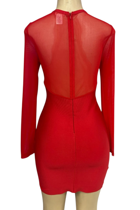 Red dress with mesh panels on a mannequin against a white background