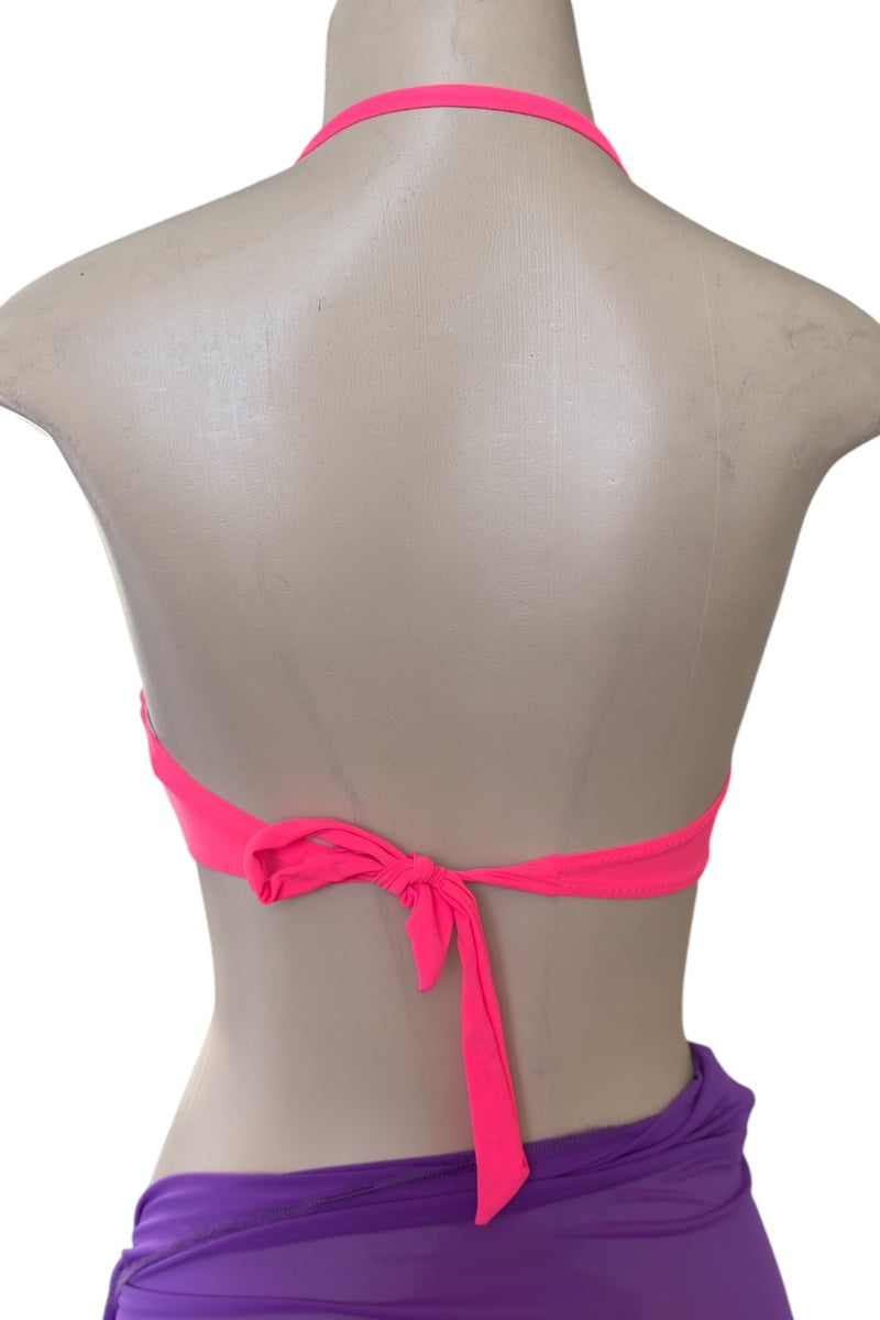 Mannequin wearing a cora bikini top with a purple bottom on a white background