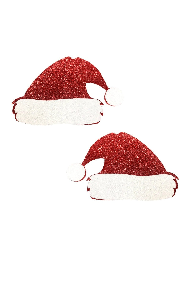 Two red glittery Santa hats on a white background