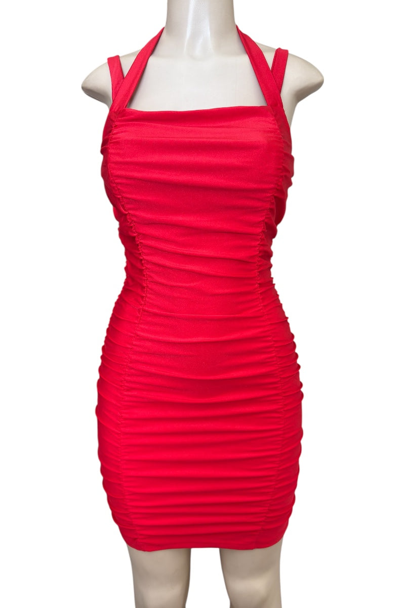 Red dress on a mannequin against a white background