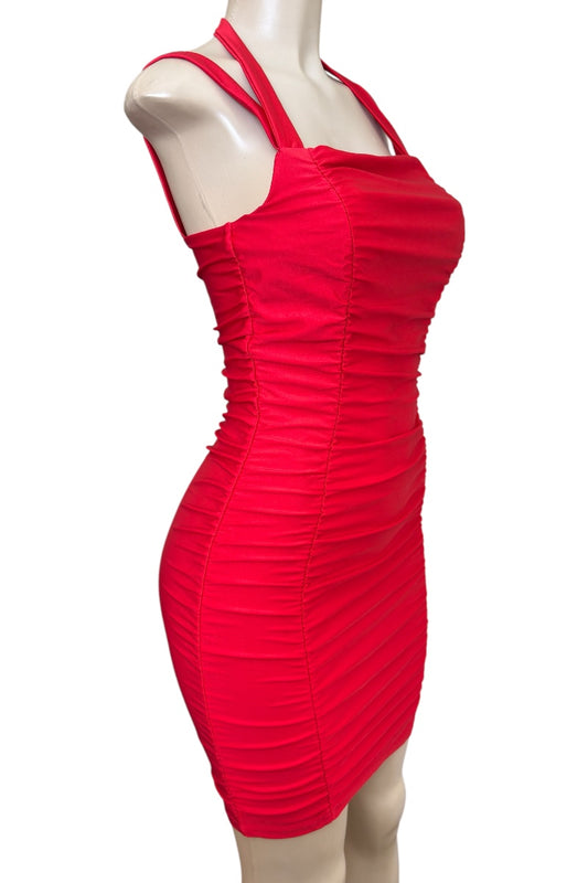 Red dress on a mannequin against a white background
