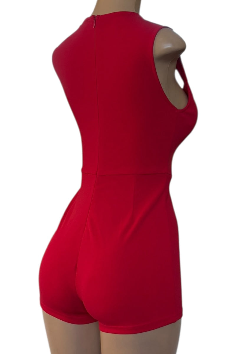 Red romper on a mannequin against a white background