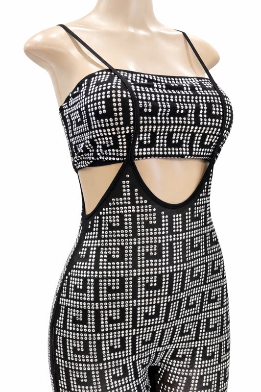 Black and silver patterned jumpsuit on a mannequin against a white background