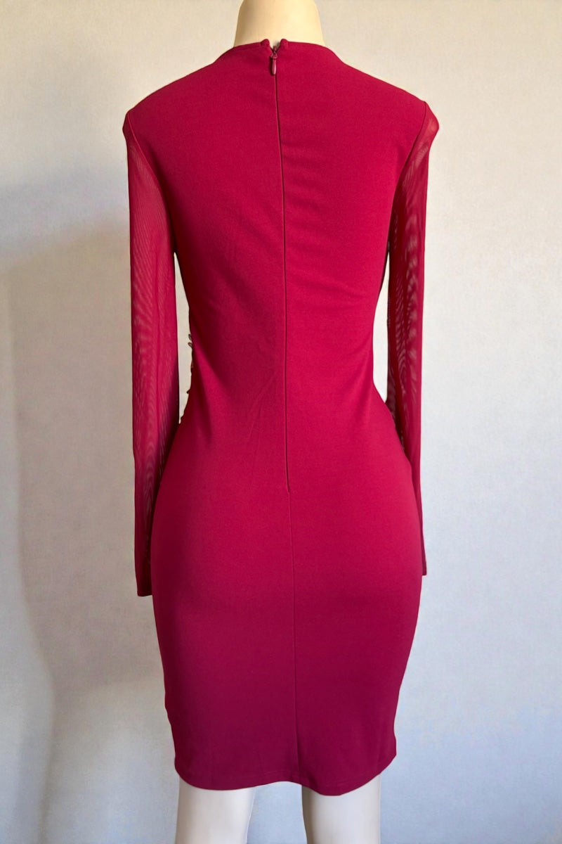 burgundy dress on a mannequin against a white background