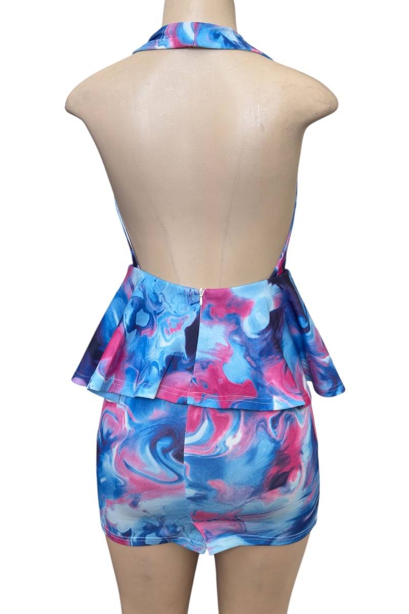 Colorful dress with peplum top on a mannequin against a white background