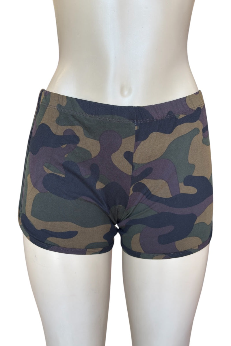 Camouflage-patterned shorts on a mannequin against a white background