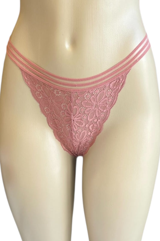 Pink lace thong on a mannequin against a white background